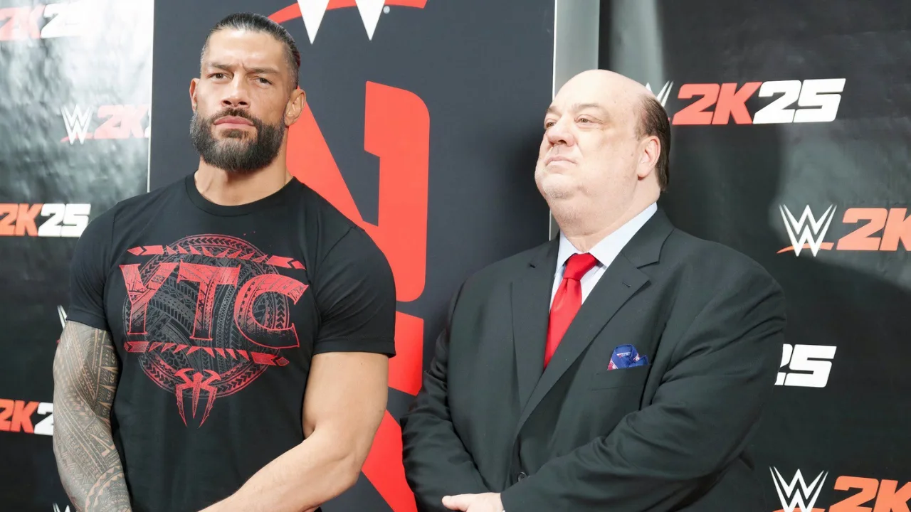 Roman Reigns Confronts The Rock's Fan As Paul Heyman Calls His Outfit Stupid